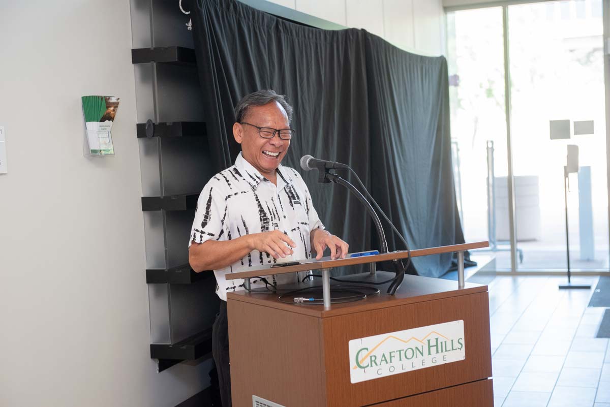 People enjoying the Legacy Wall unveiling
