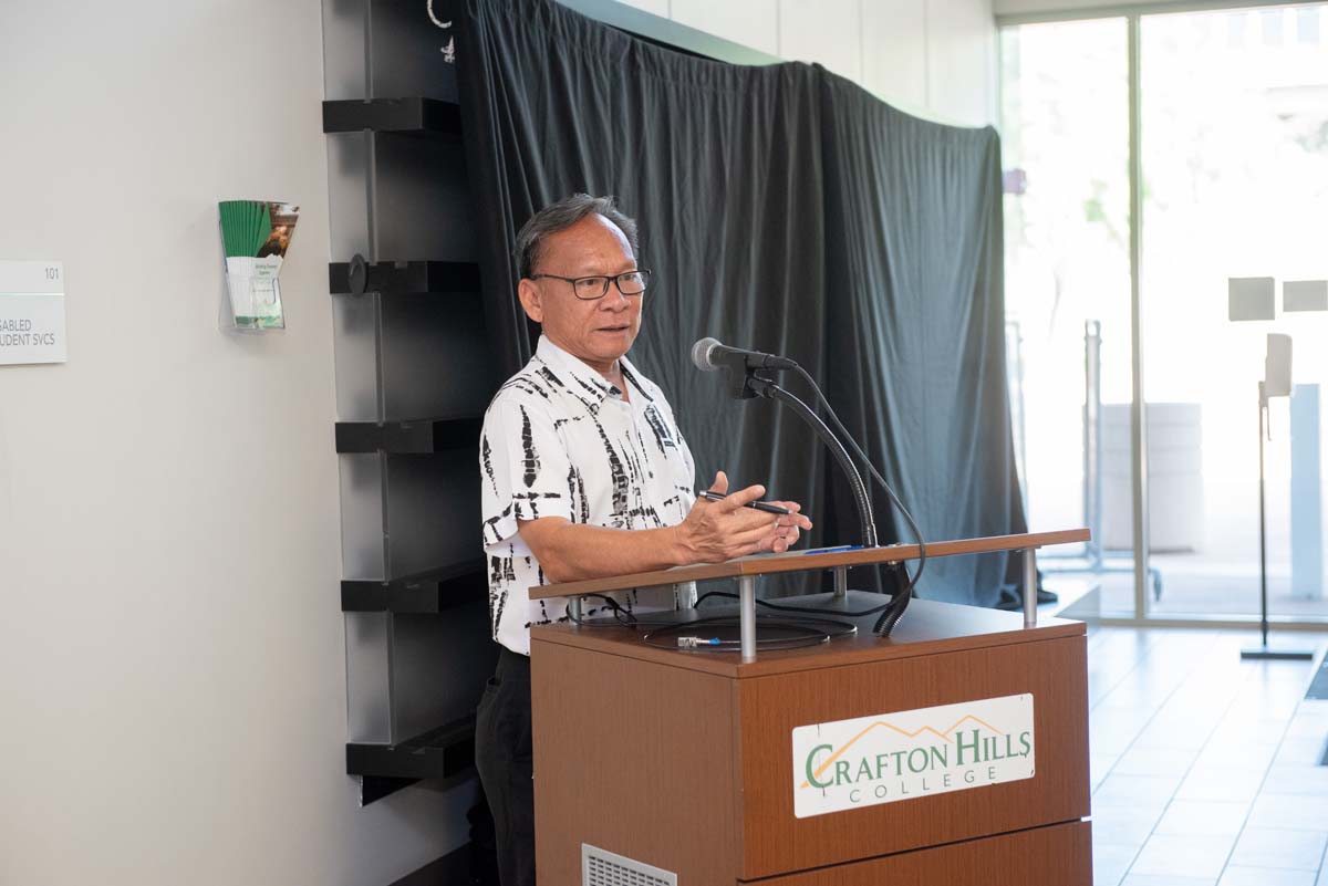 People enjoying the Legacy Wall unveiling