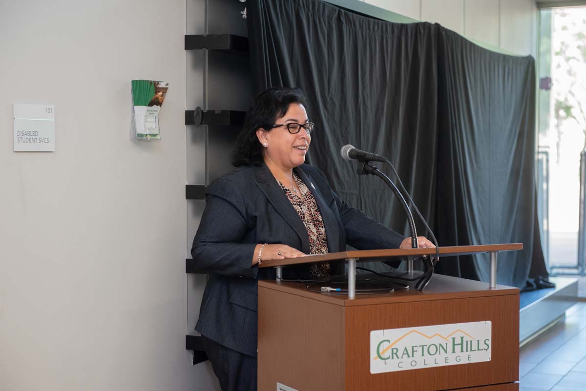 People enjoying the Legacy Wall unveiling