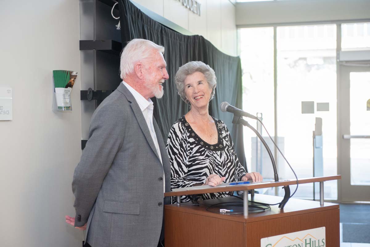 People enjoying the Legacy Wall unveiling