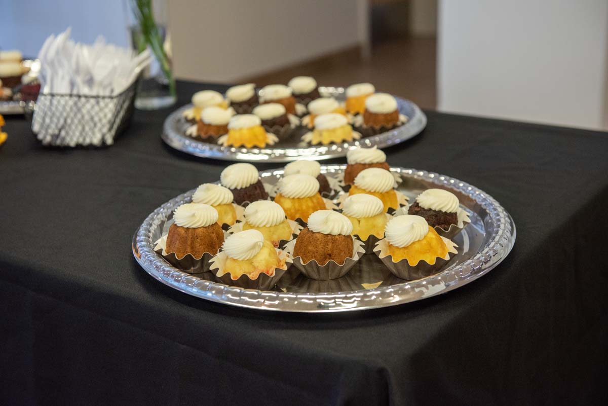 People enjoying the Legacy Wall unveiling