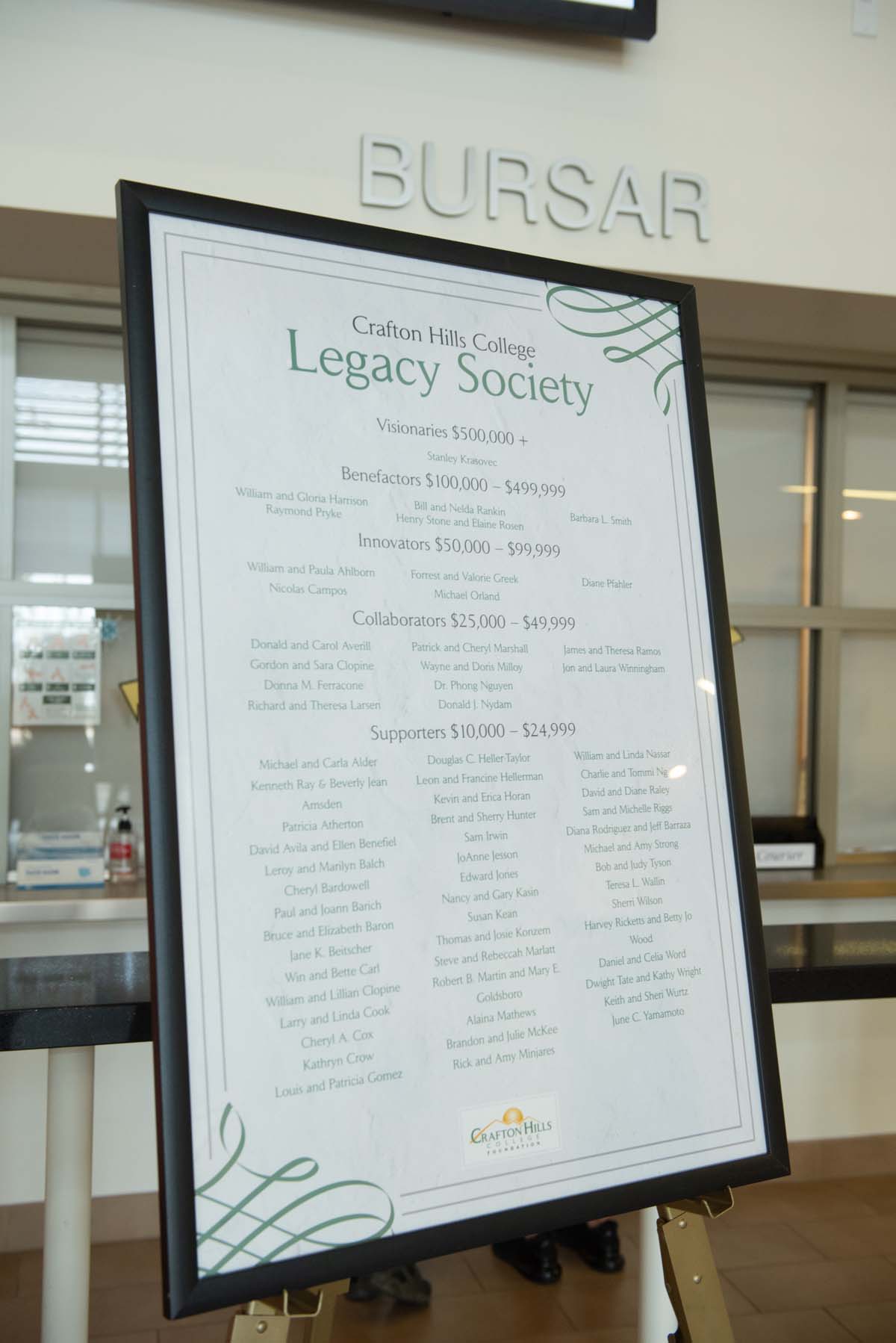 People enjoying the Legacy Wall unveiling