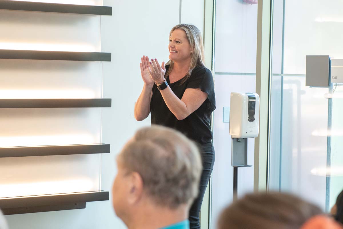 People enjoying the Legacy Wall unveiling
