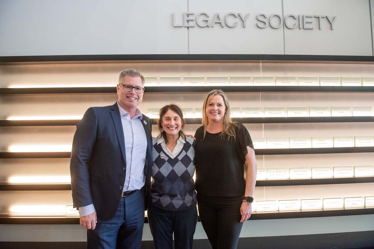 People enjoying the Legacy Wall unveiling