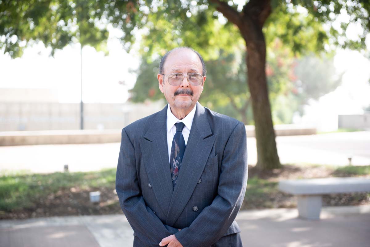 People enjoying the Legacy Wall unveiling