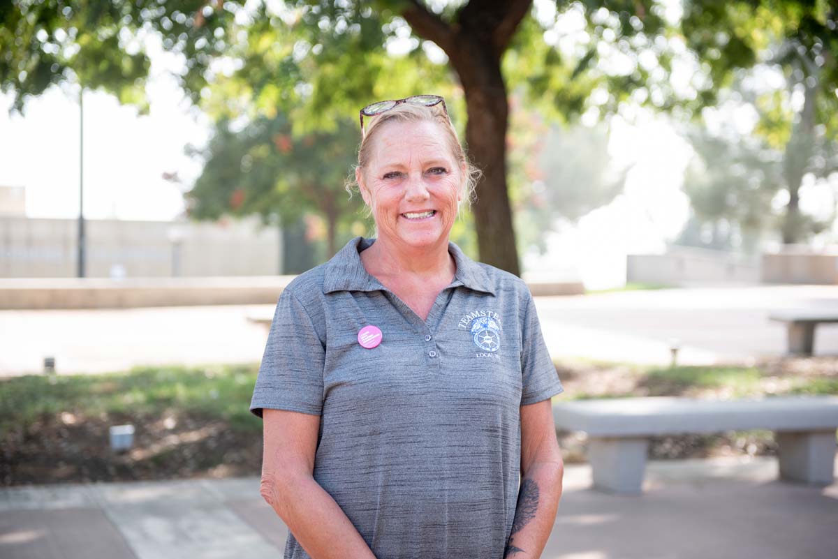 People enjoying the Legacy Wall unveiling