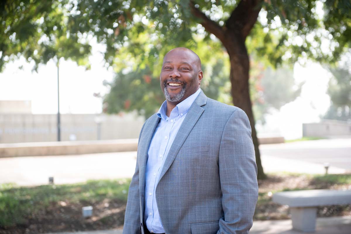 People enjoying the Legacy Wall unveiling
