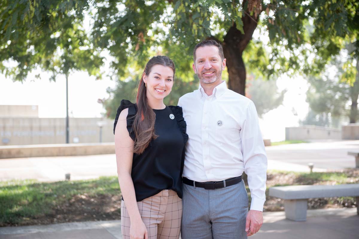 People enjoying the Legacy Wall unveiling