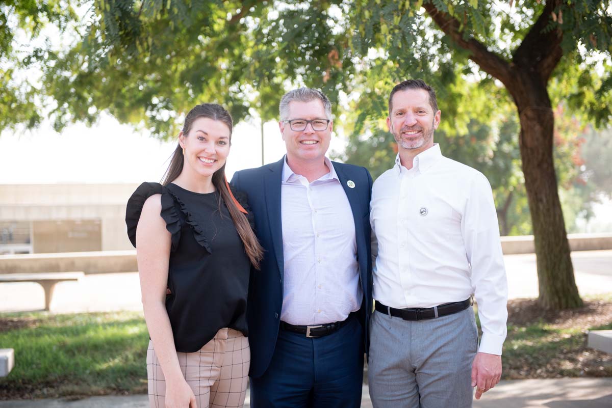 People enjoying the Legacy Wall unveiling