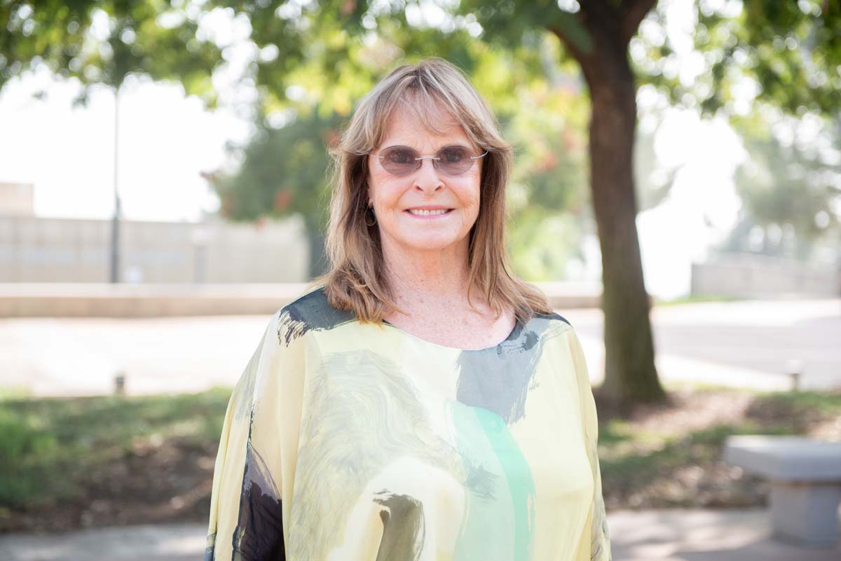 People enjoying the Legacy Wall unveiling