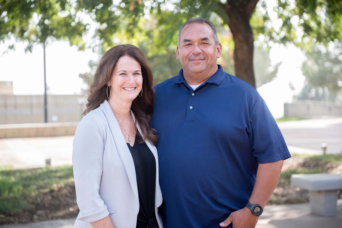 People enjoying the Legacy Wall unveiling
