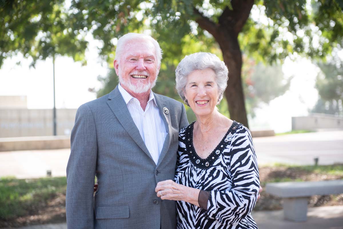 People enjoying the Legacy Wall unveiling