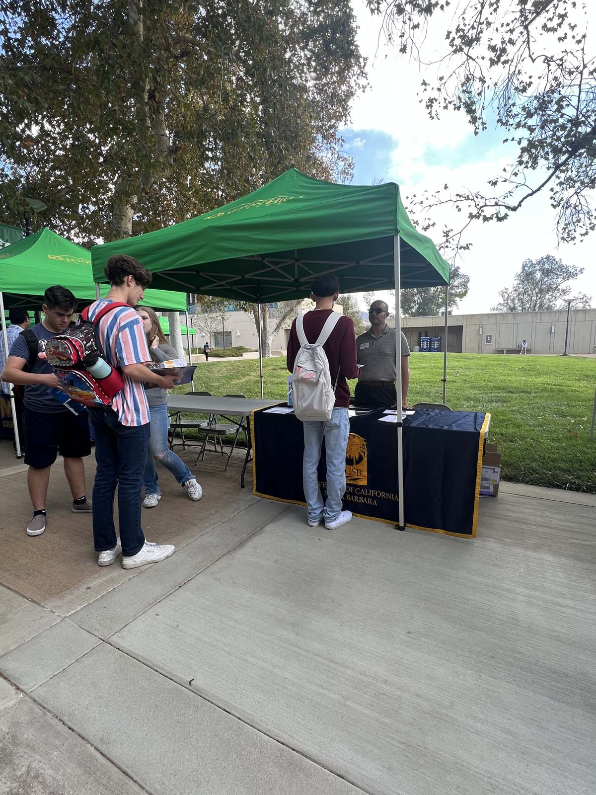 People enjoying the Transfer Fair and Hispanic Heritage Kickoff Event
