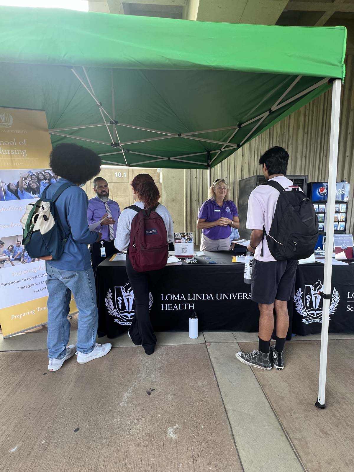 People enjoying the Transfer Fair and Hispanic Heritage Kickoff Event