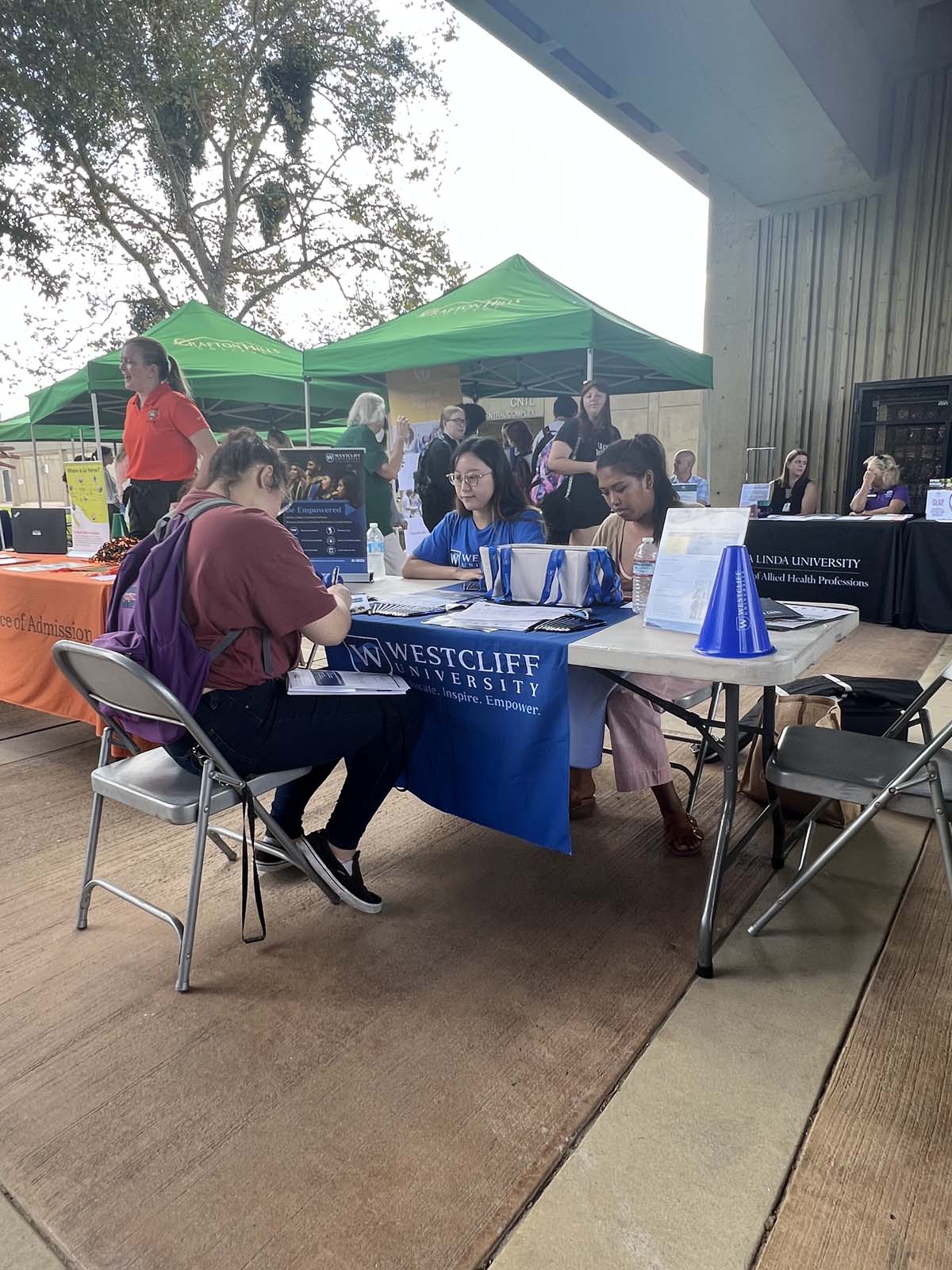 People enjoying the Transfer Fair and Hispanic Heritage Kickoff Event