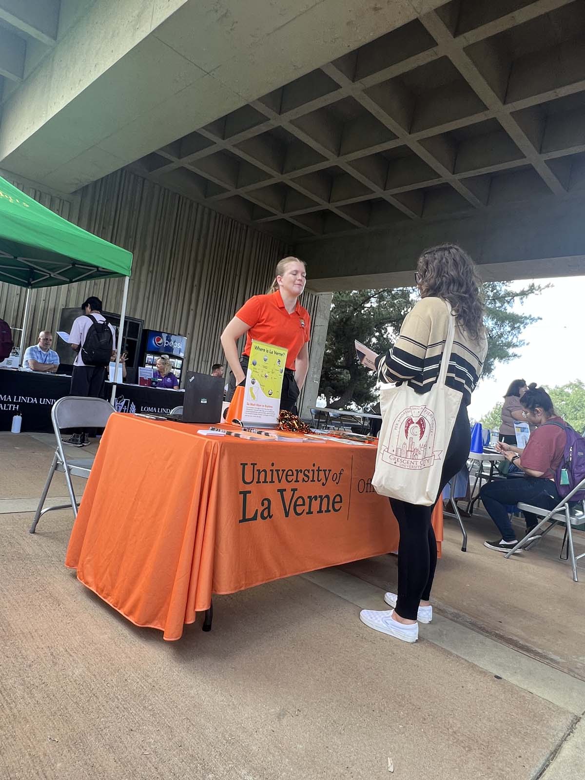 People enjoying the Transfer Fair and Hispanic Heritage Kickoff Event