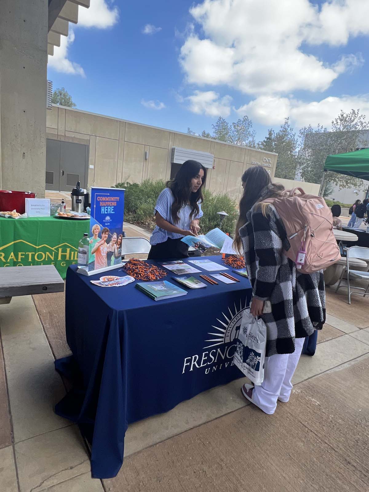 People enjoying the Transfer Fair and Hispanic Heritage Kickoff Event