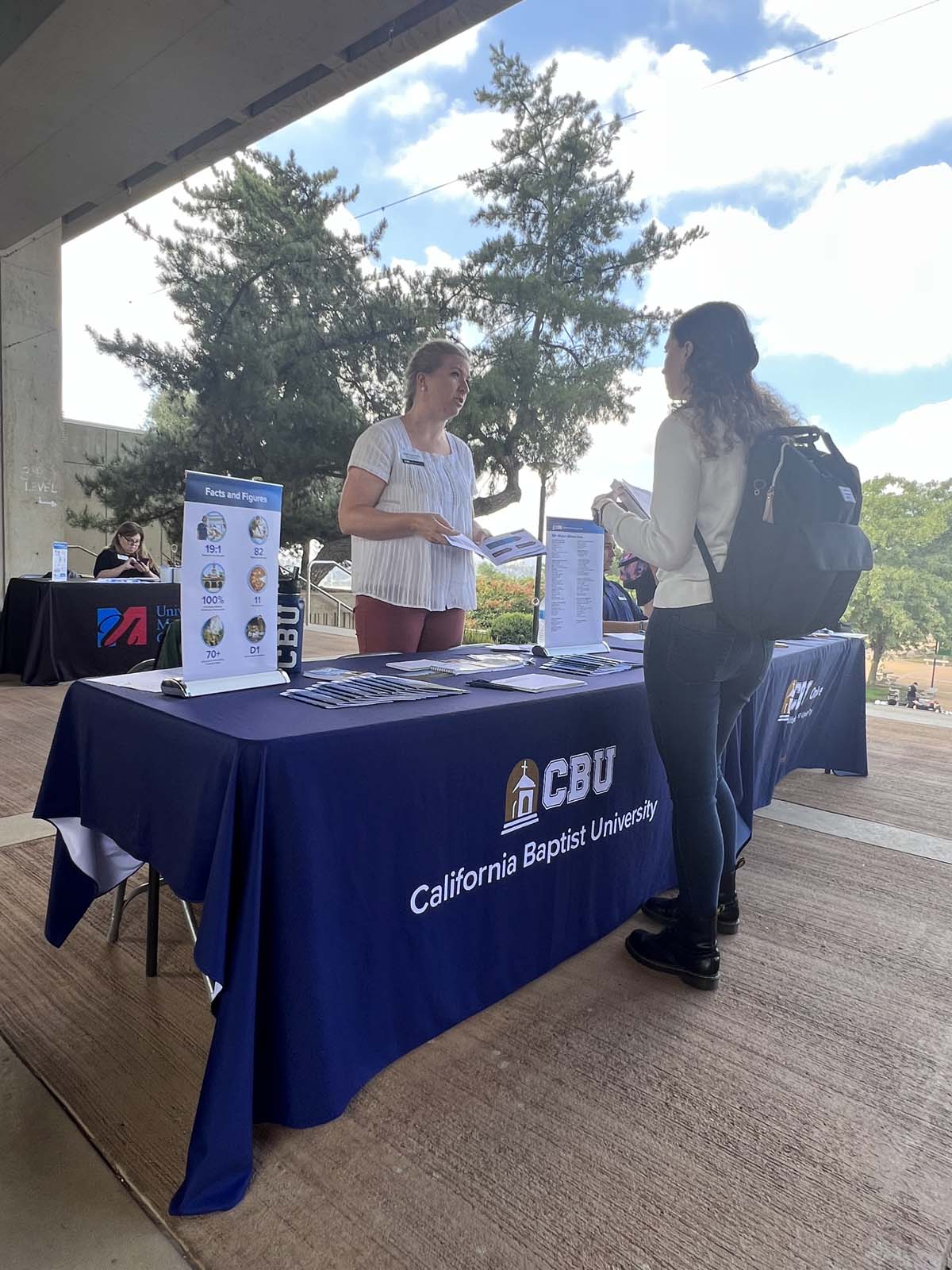 People enjoying the Transfer Fair and Hispanic Heritage Kickoff Event