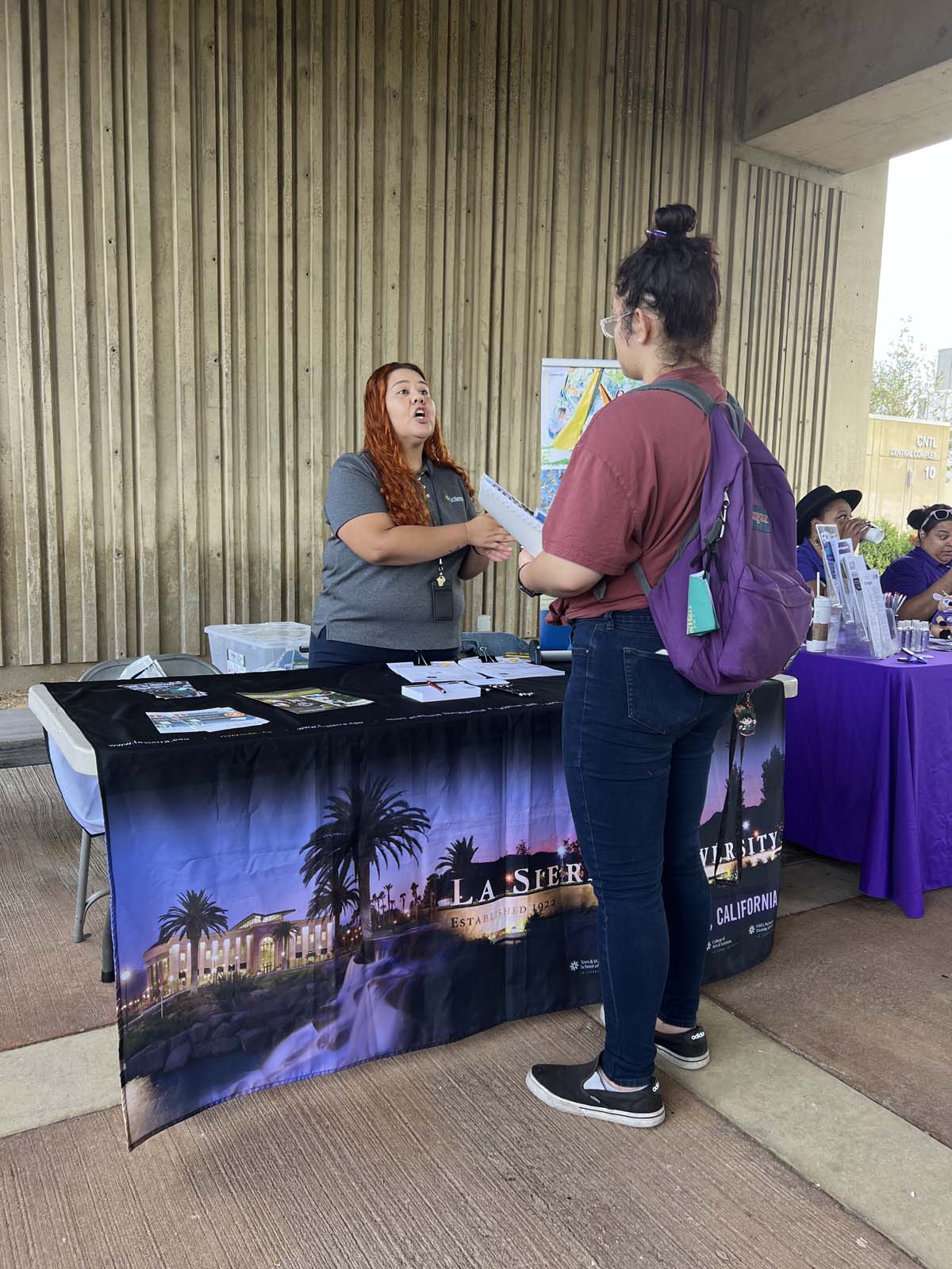 People enjoying the Transfer Fair and Hispanic Heritage Kickoff Event