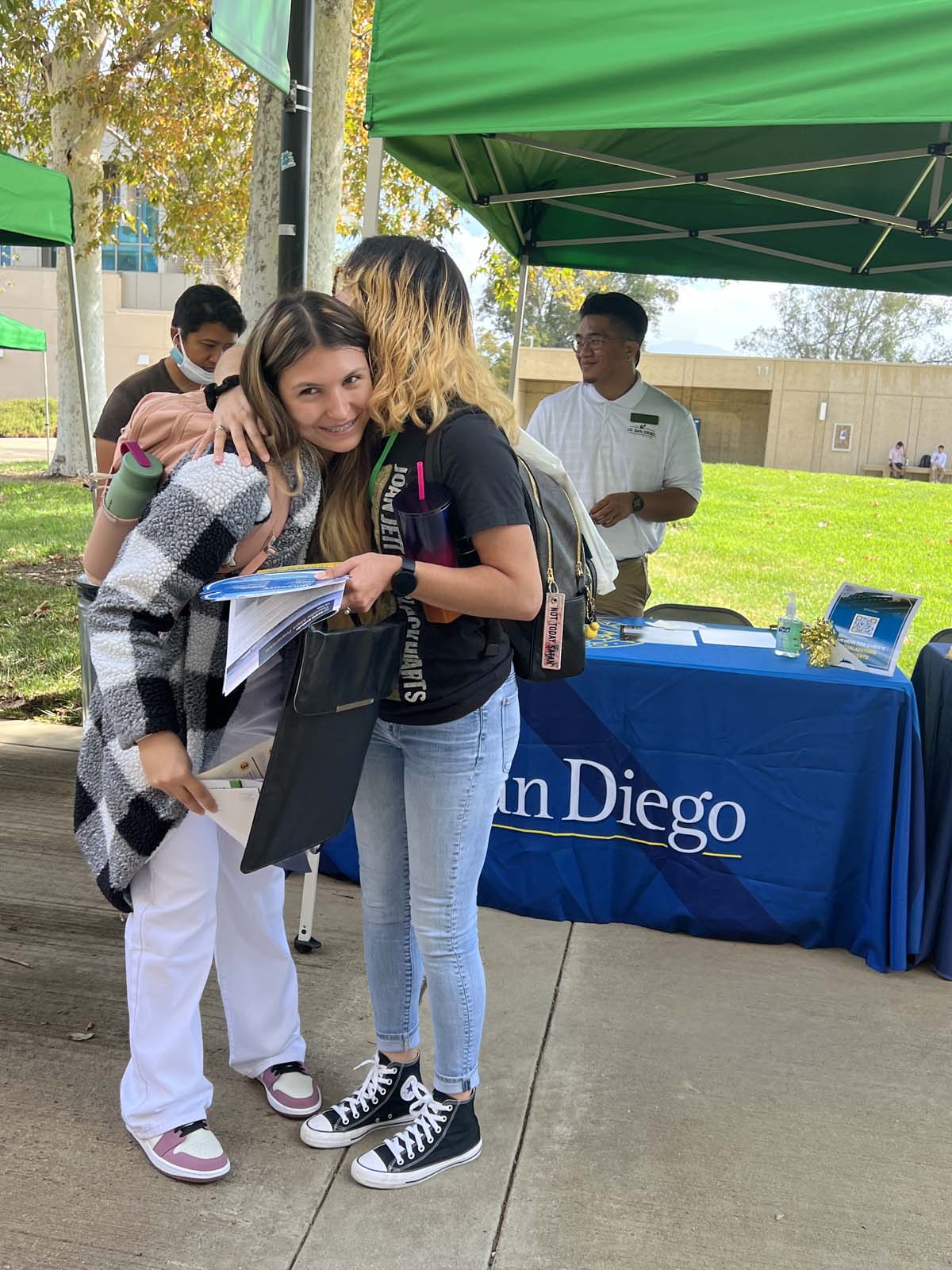 People enjoying the Transfer Fair and Hispanic Heritage Kickoff Event