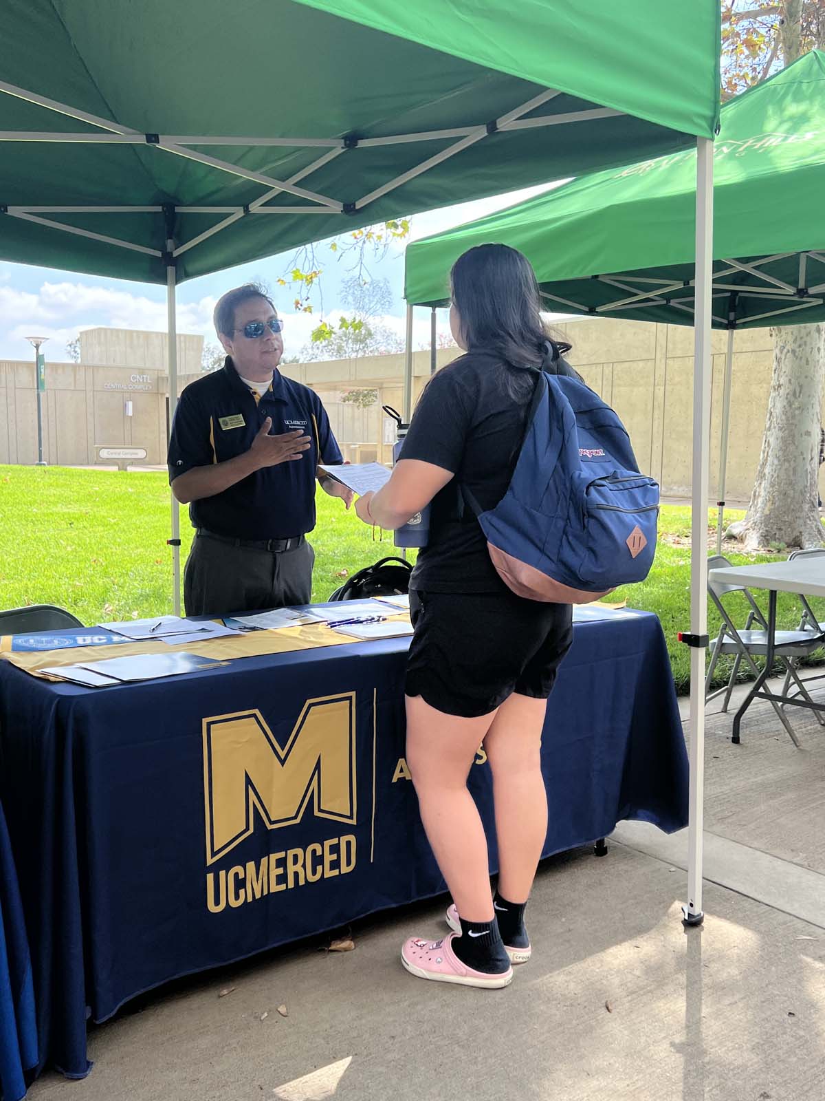 People enjoying the Transfer Fair and Hispanic Heritage Kickoff Event