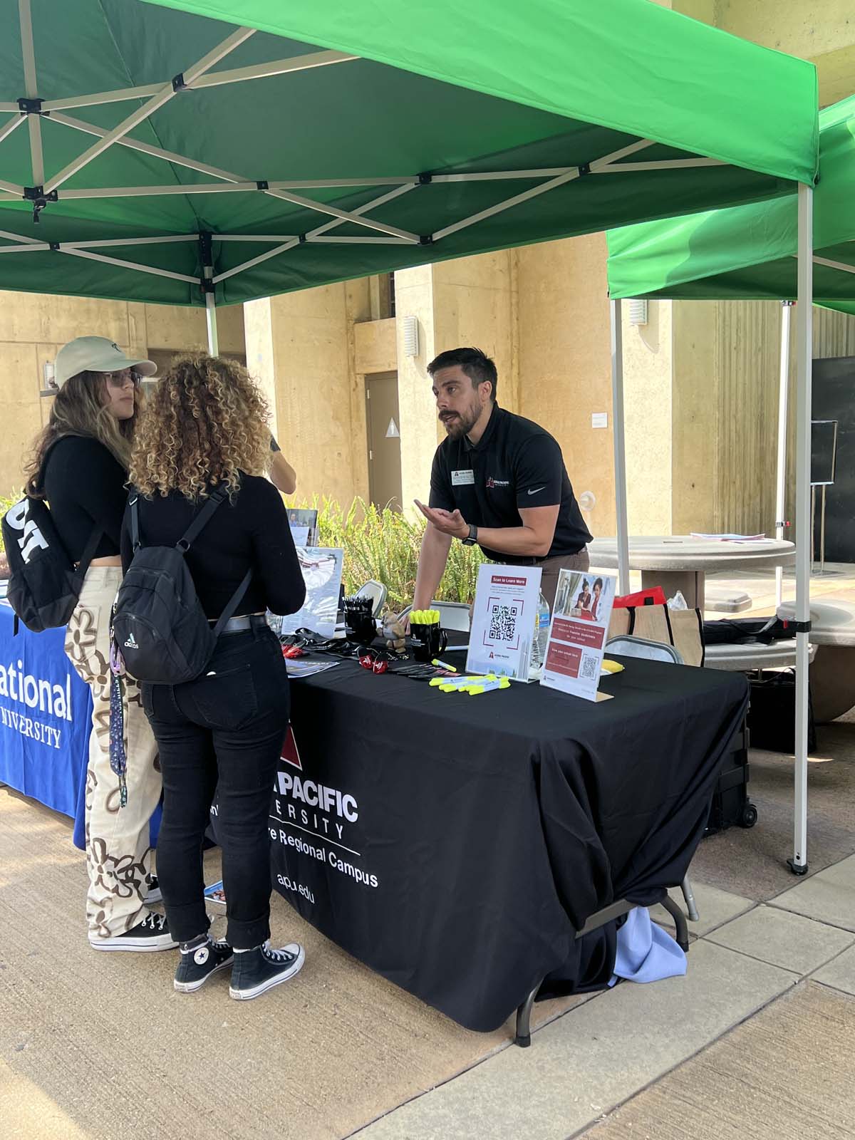 People enjoying the Transfer Fair and Hispanic Heritage Kickoff Event