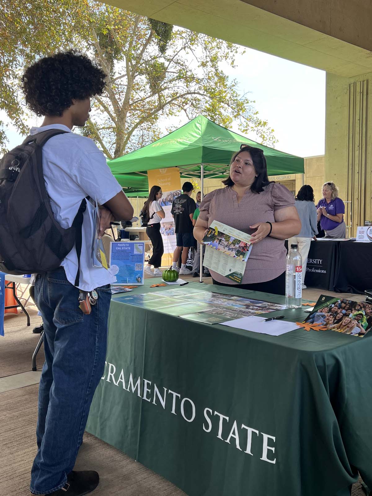 People enjoying the Transfer Fair and Hispanic Heritage Kickoff Event