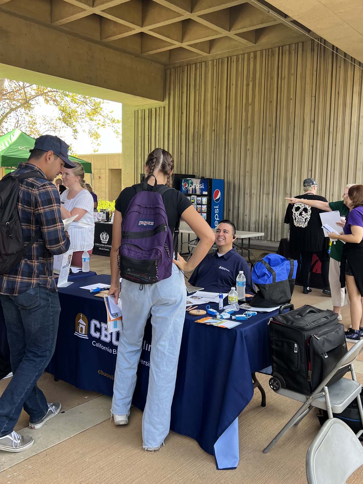 People enjoying the Transfer Fair and Hispanic Heritage Kickoff Event