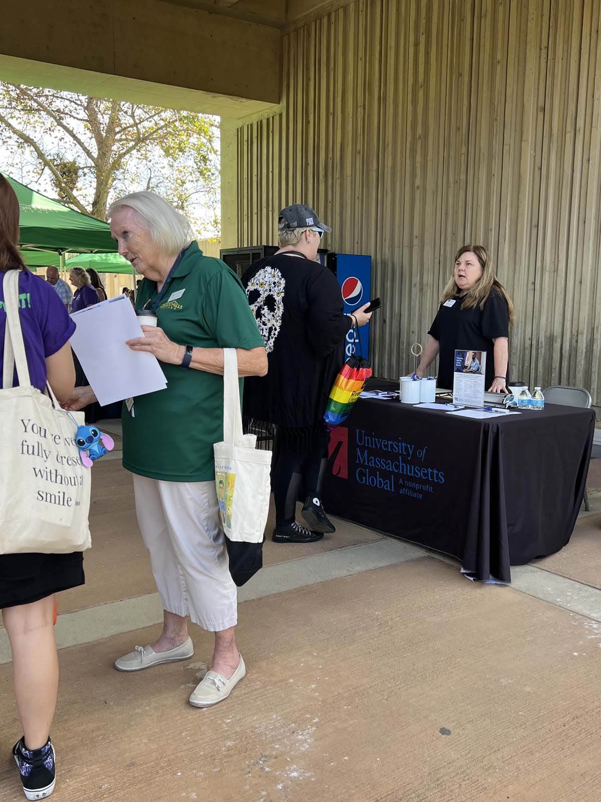 People enjoying the Transfer Fair and Hispanic Heritage Kickoff Event