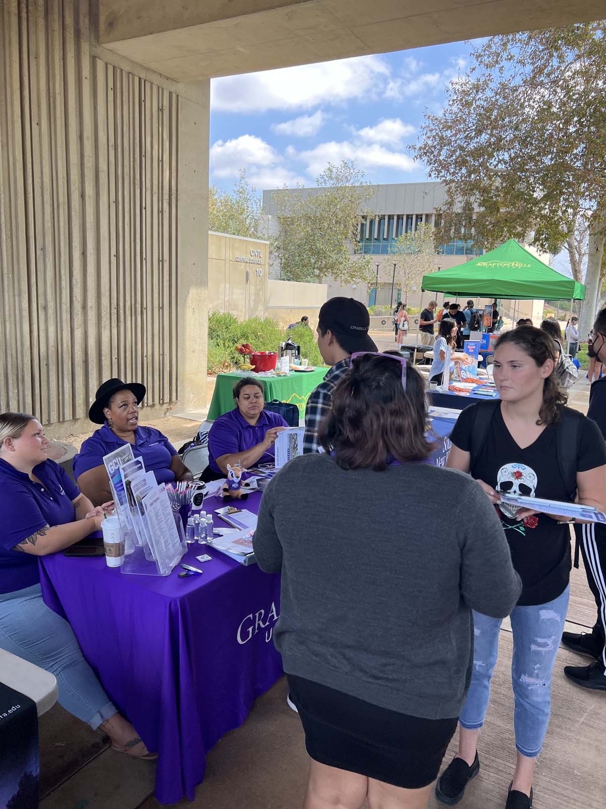 People enjoying the Transfer Fair and Hispanic Heritage Kickoff Event
