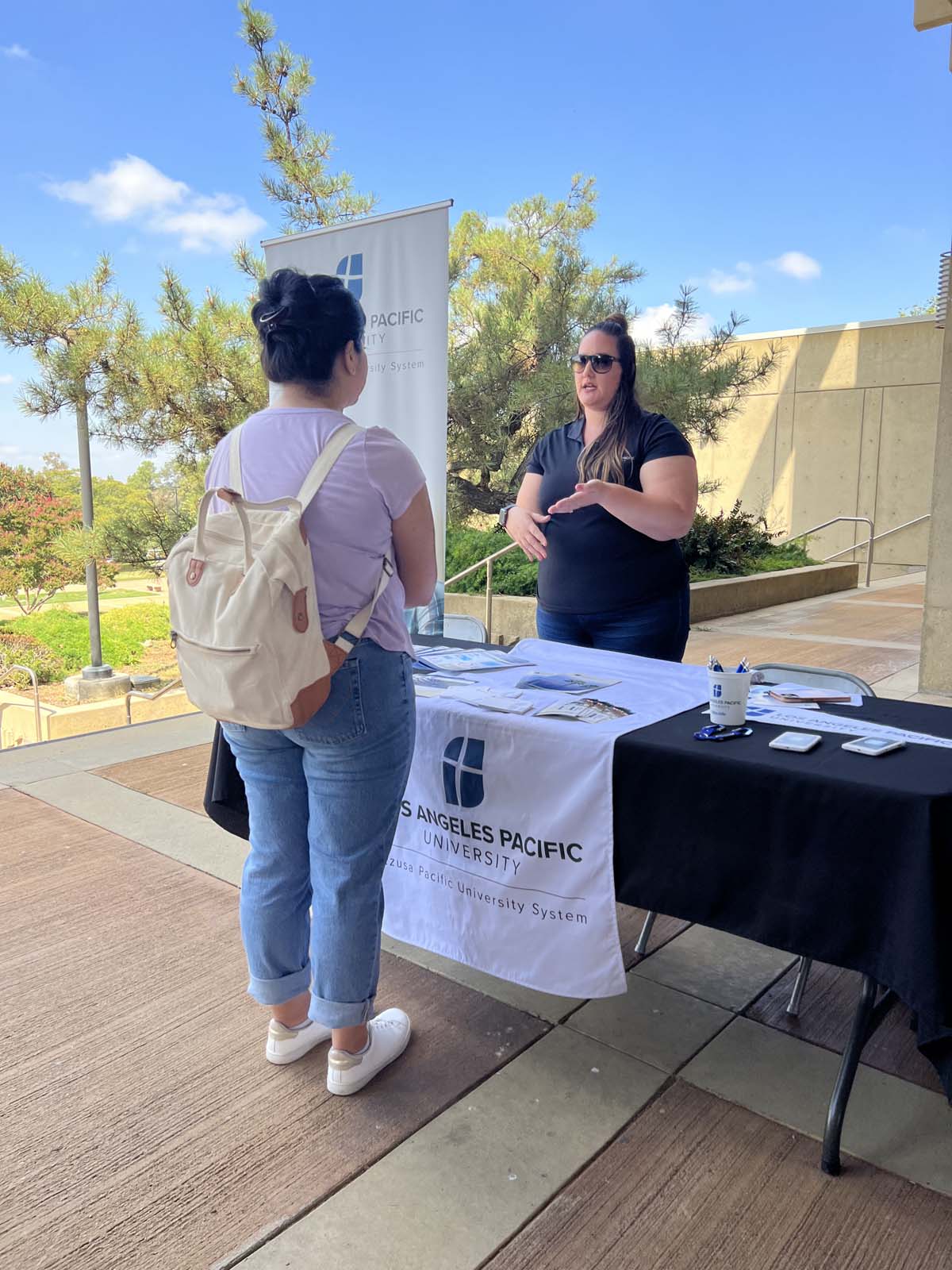People enjoying the Transfer Fair and Hispanic Heritage Kickoff Event