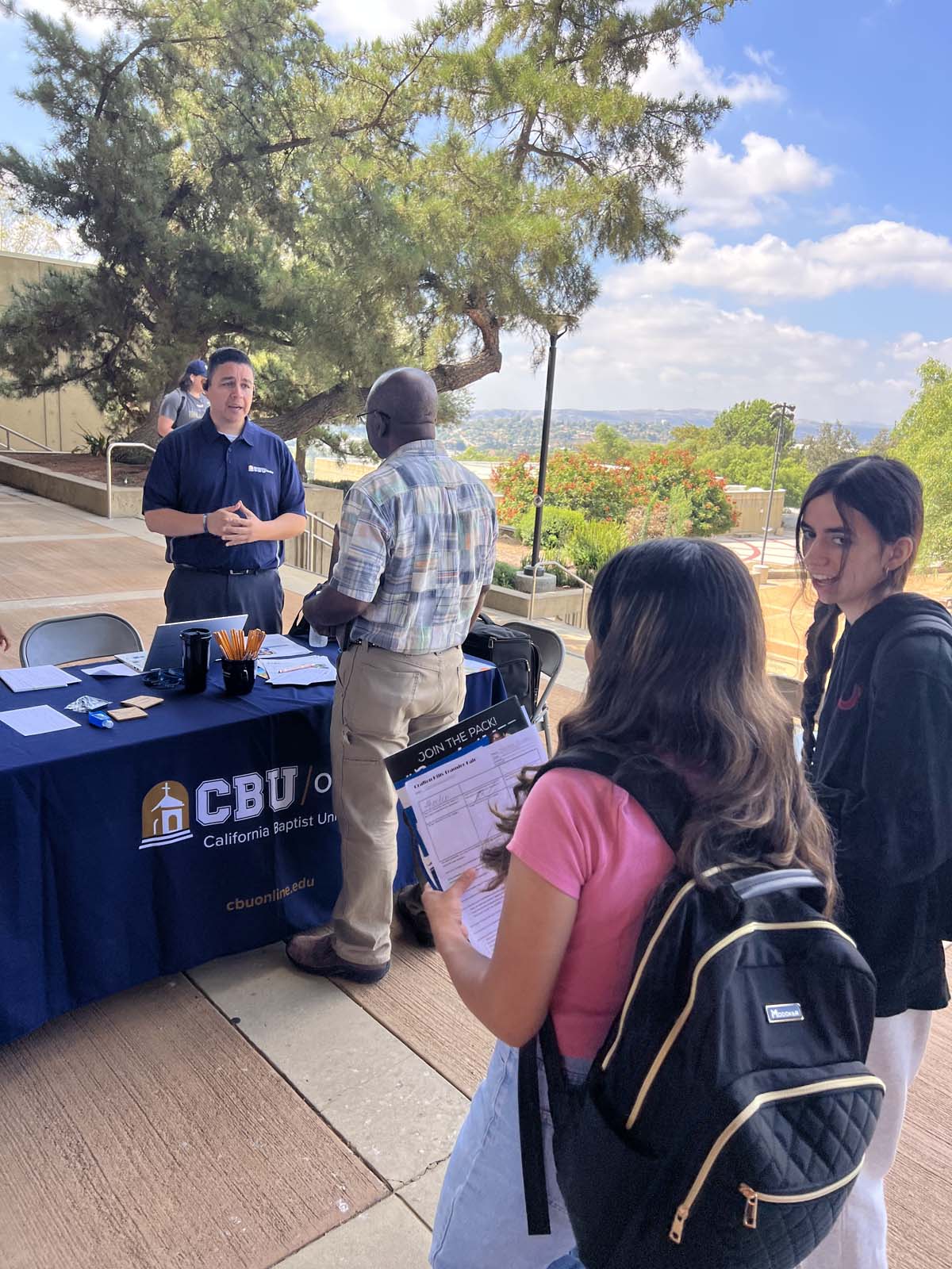 People enjoying the Transfer Fair and Hispanic Heritage Kickoff Event