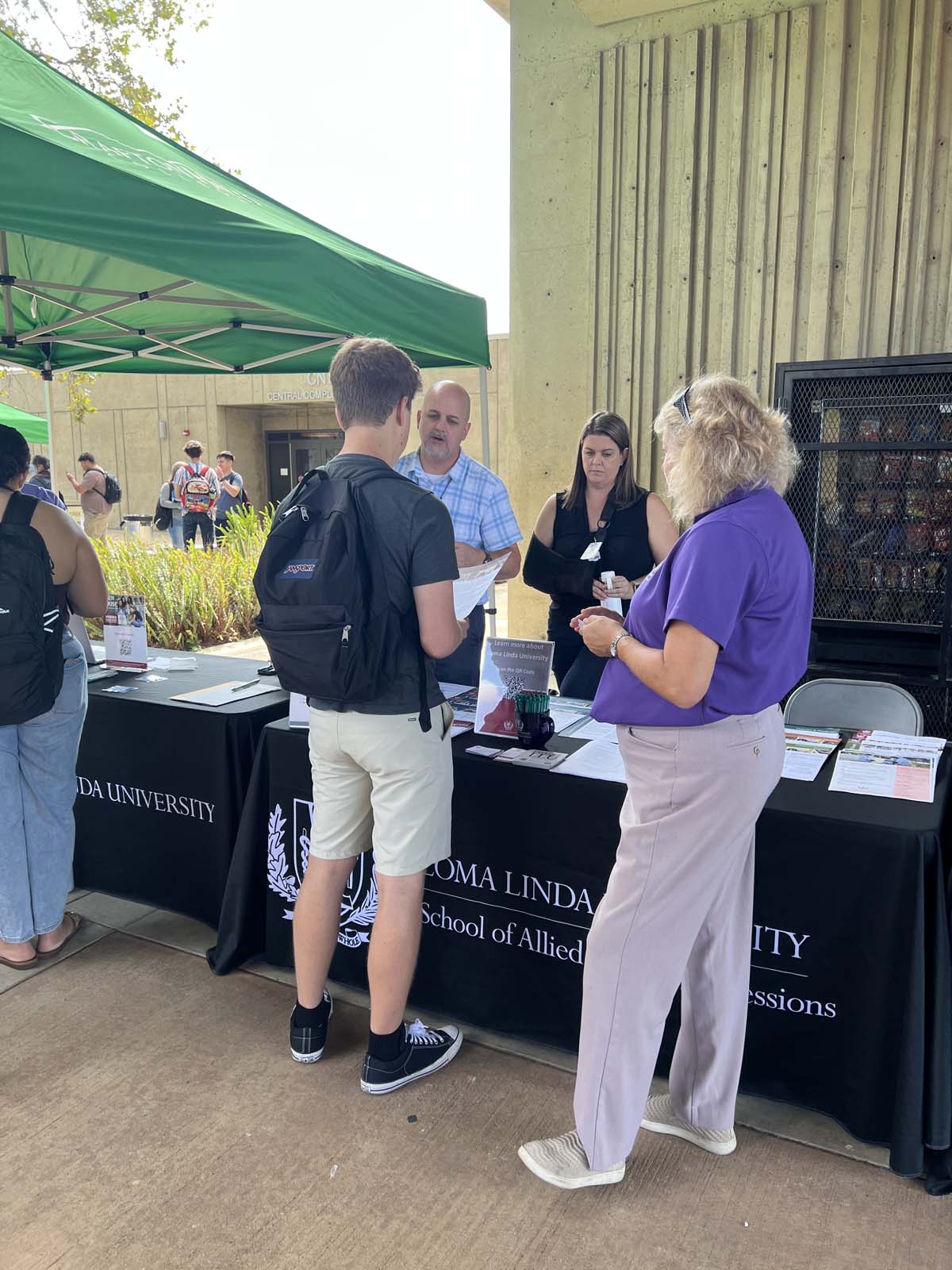 People enjoying the Transfer Fair and Hispanic Heritage Kickoff Event