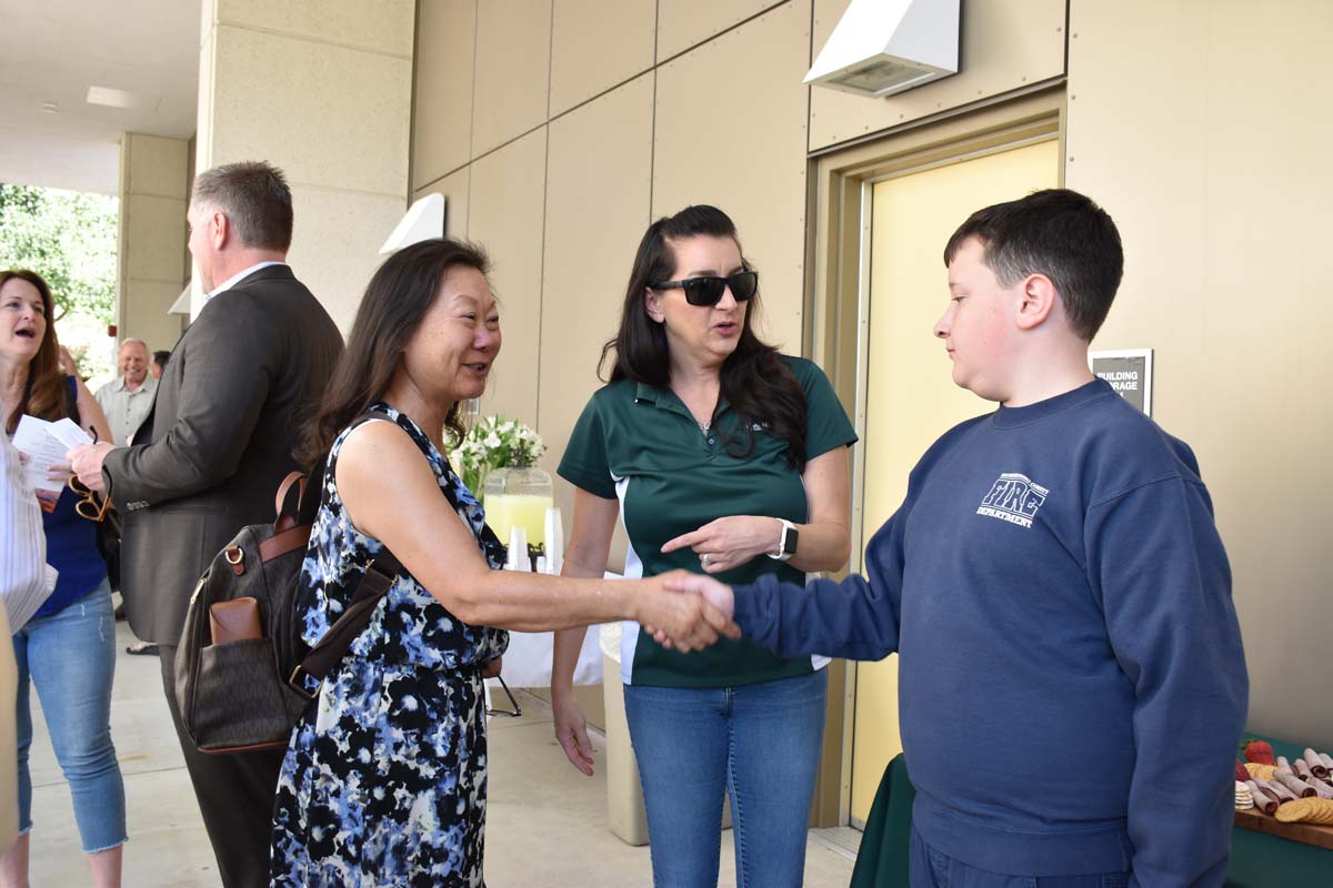 People enjoying the naming event