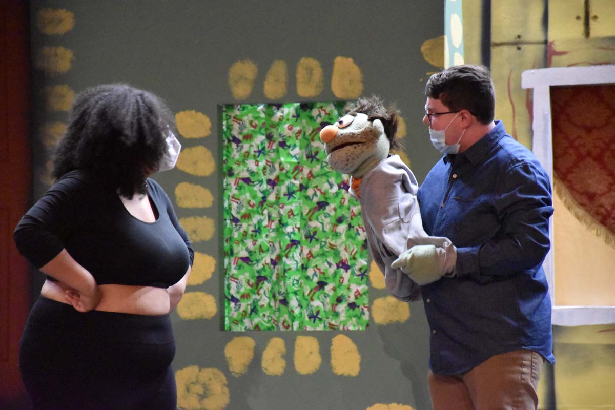 Performers at an Avenue Q rehearsal