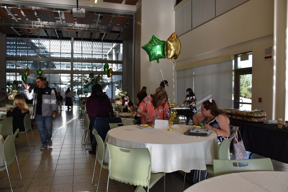 People enjoying the Promise Program Graduation