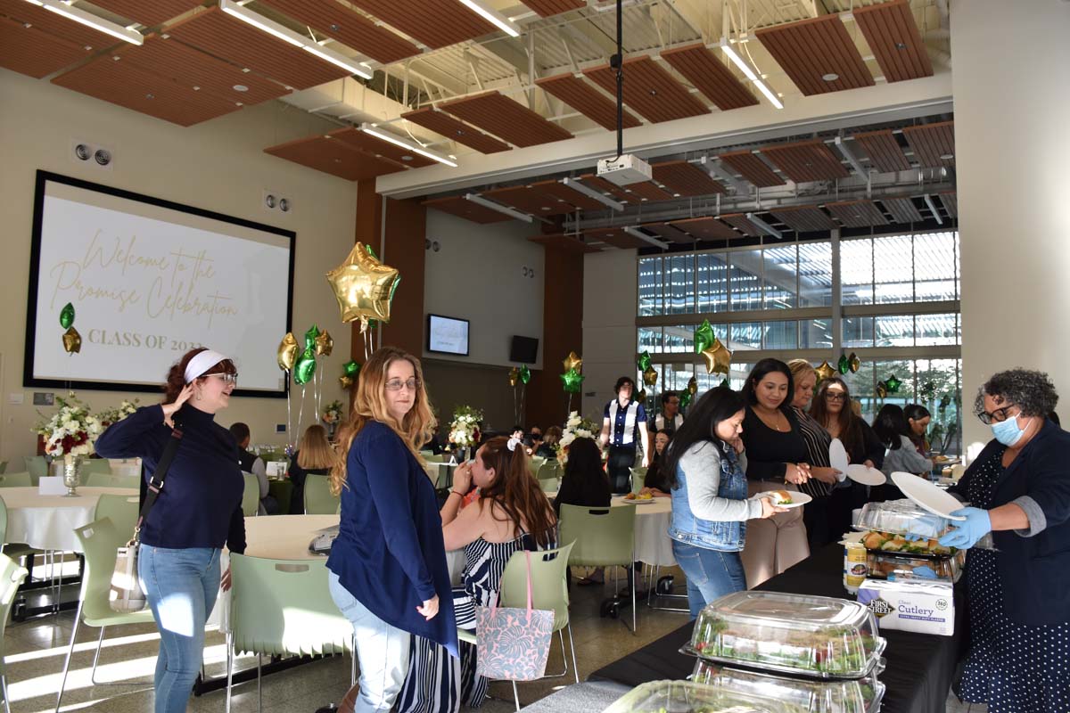 People enjoying the Promise Program Graduation