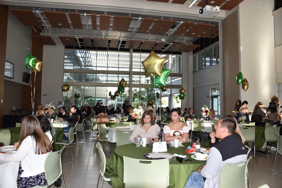 People enjoying the Promise Program Graduation