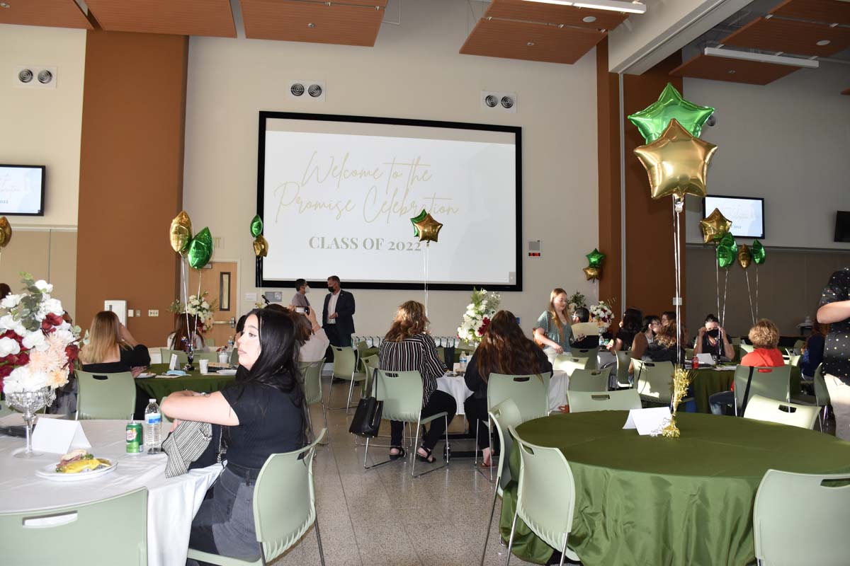 People enjoying the Promise Program Graduation