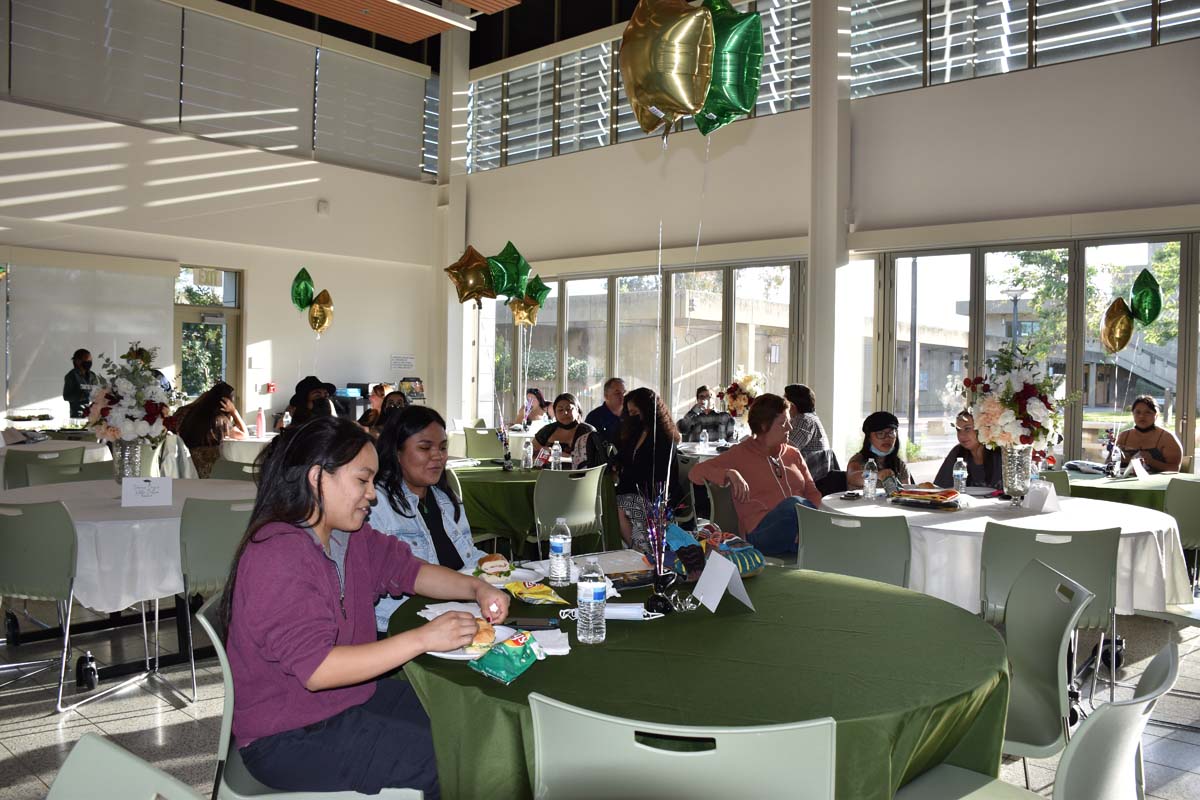 People enjoying the Promise Program Graduation