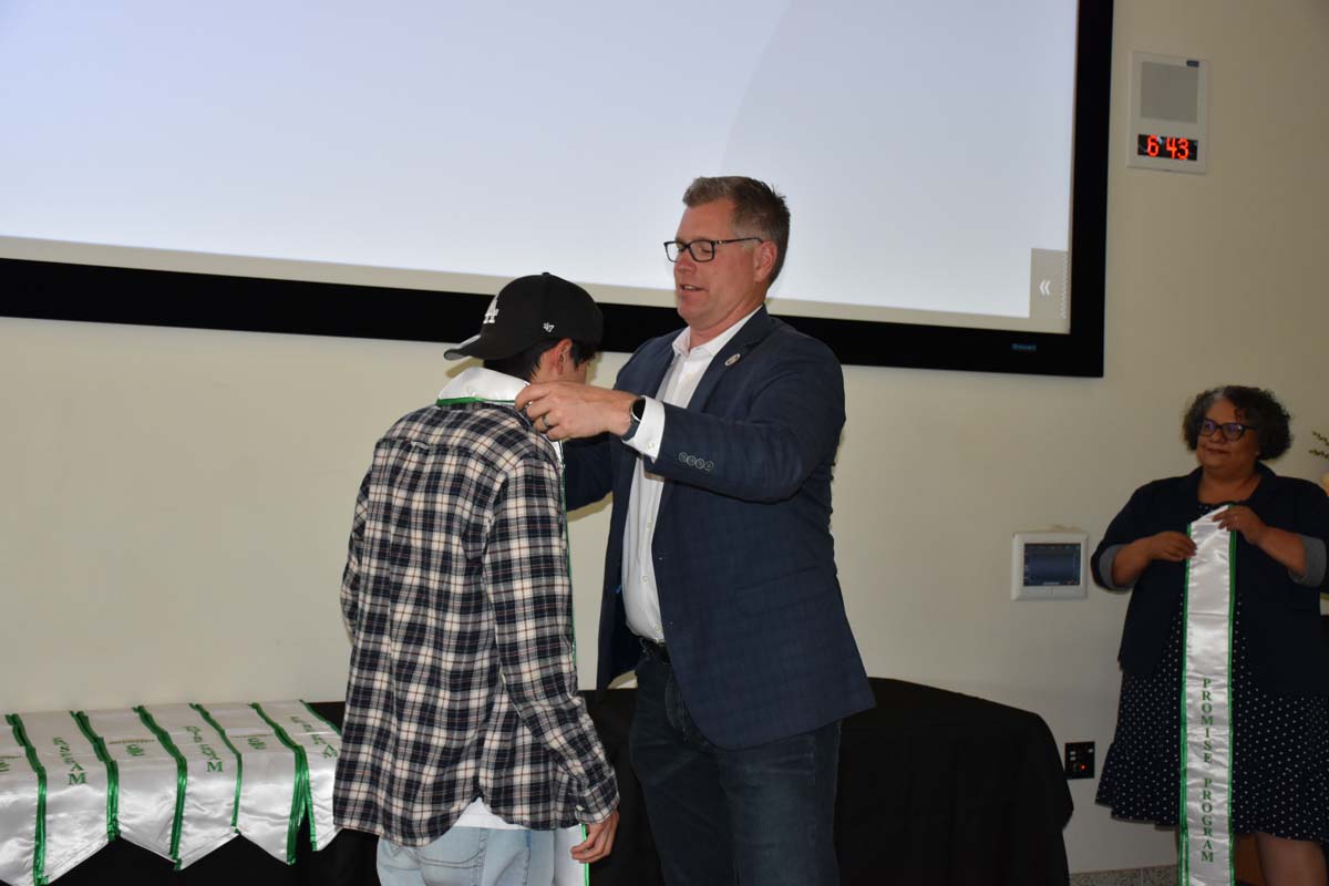 People enjoying the Promise Program Graduation