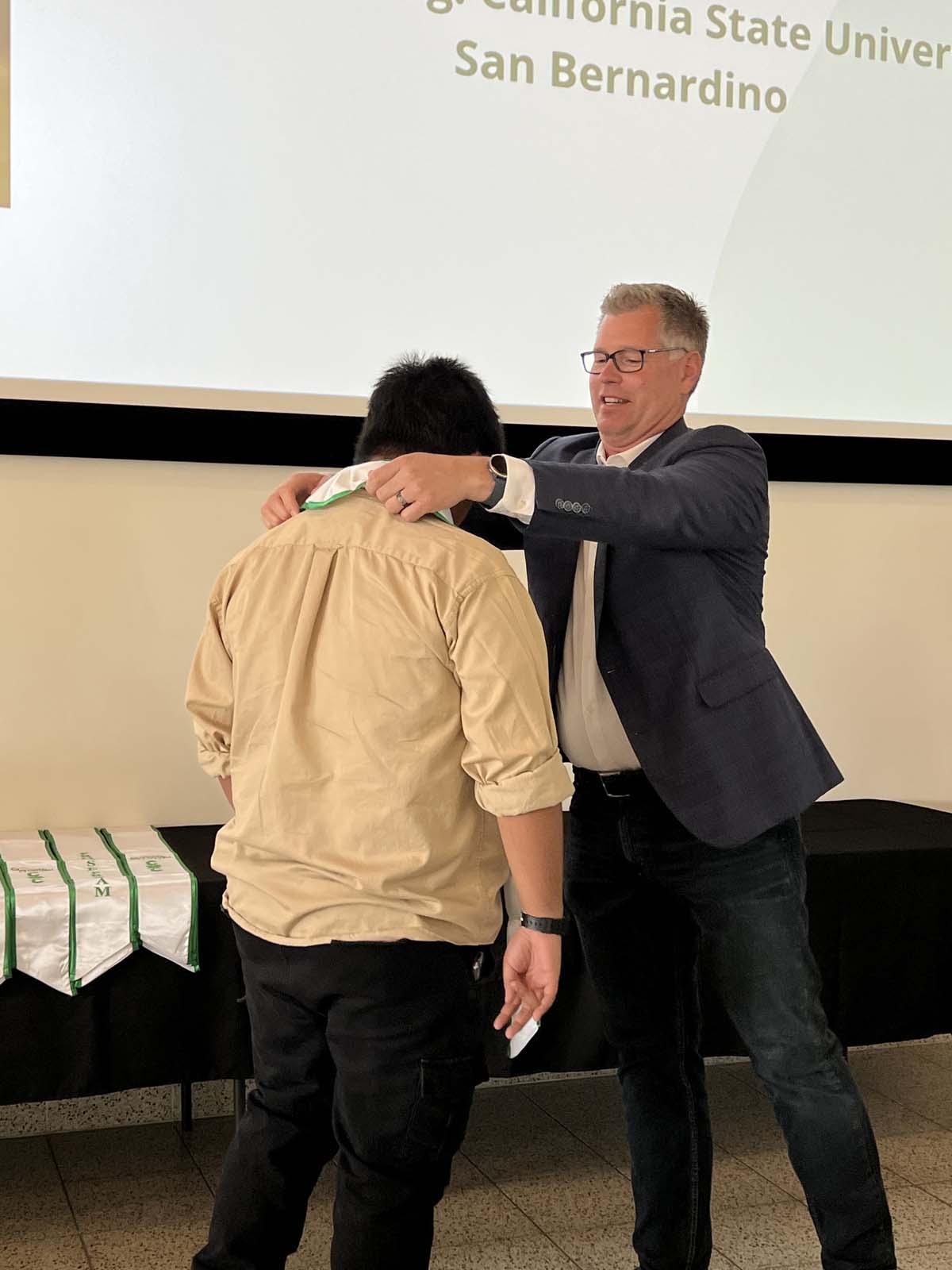 People enjoying the Promise Program Graduation