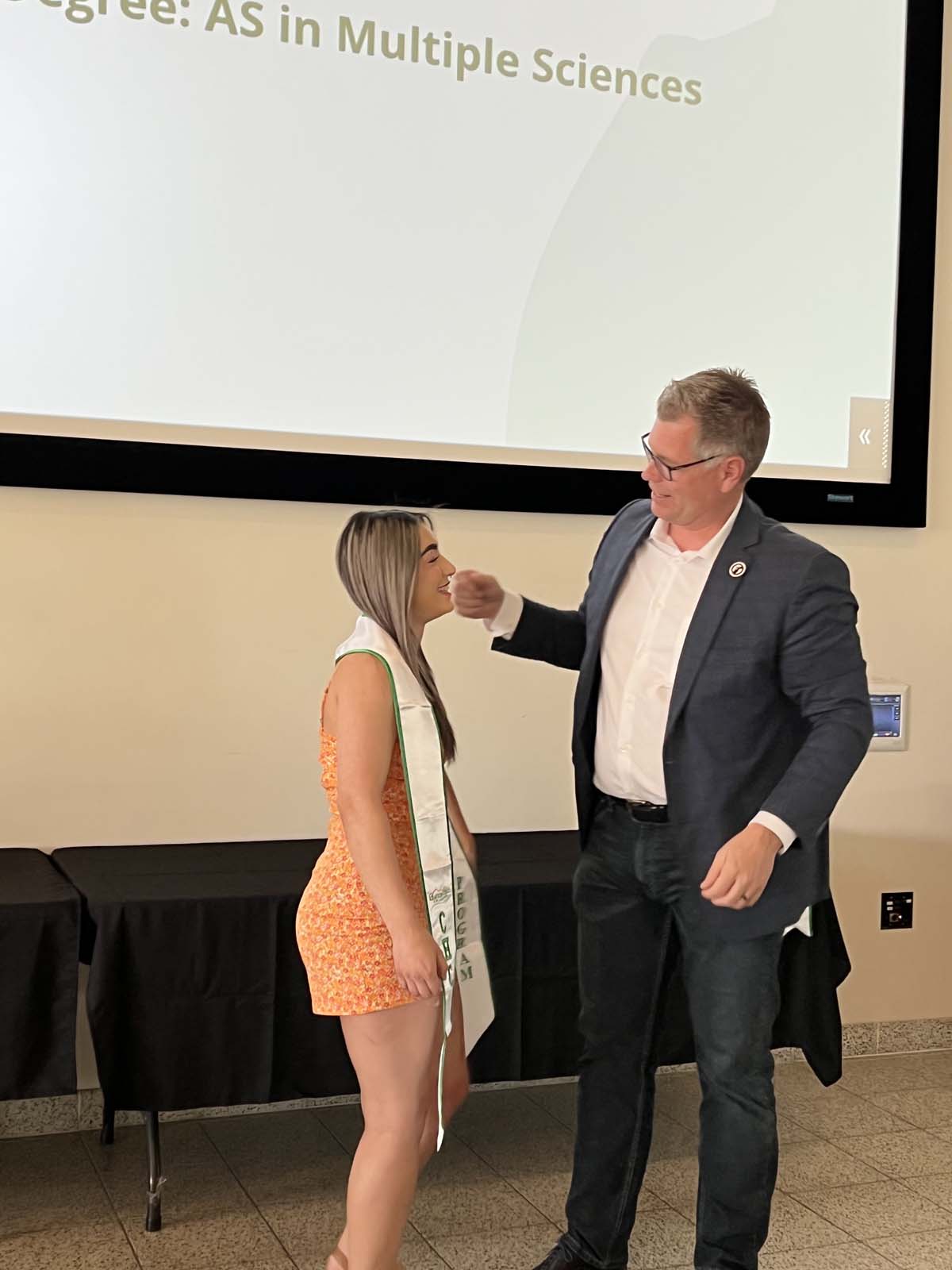 People enjoying the Promise Program Graduation