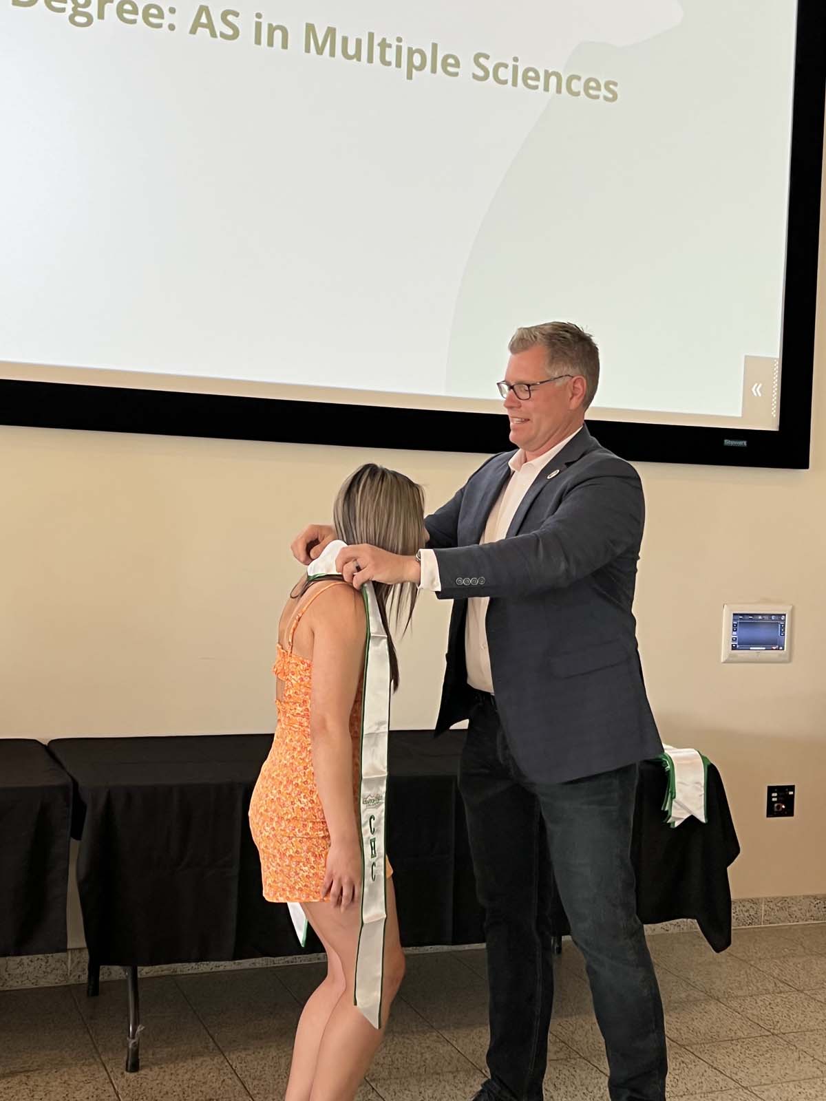 People enjoying the Promise Program Graduation