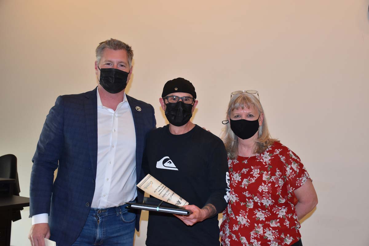 People enjoying the tenure celebration.