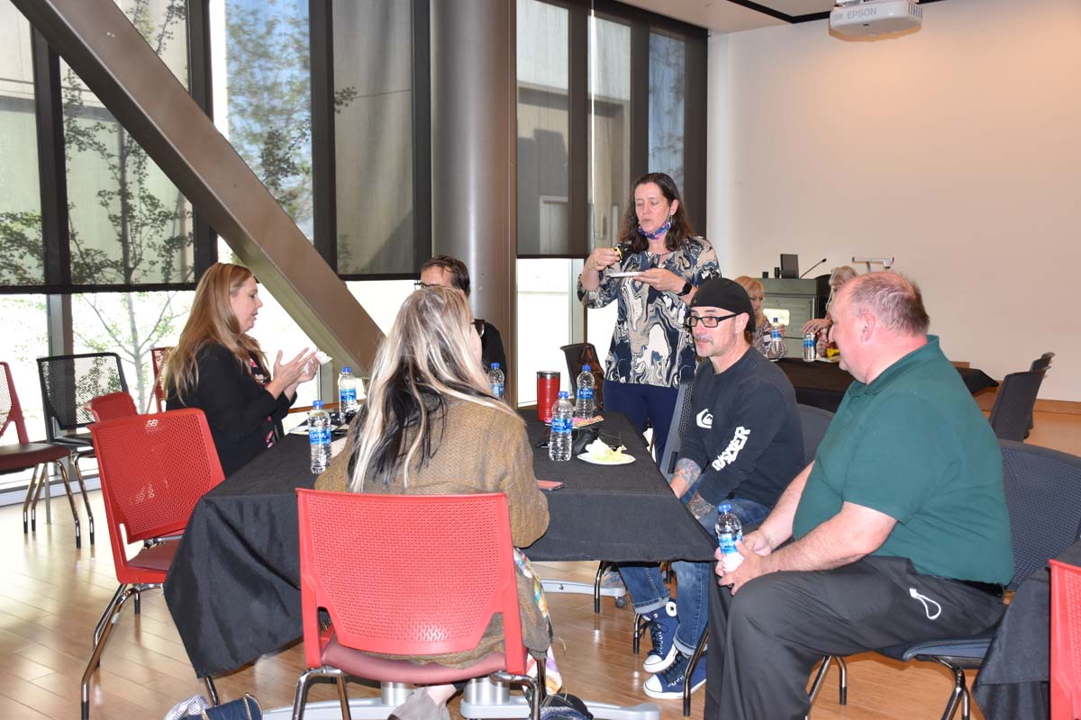 People enjoying the tenure celebration.