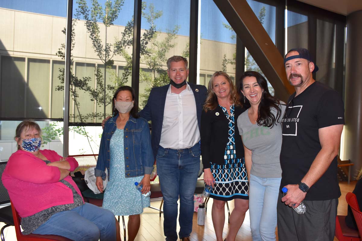 People enjoying the tenure celebration.