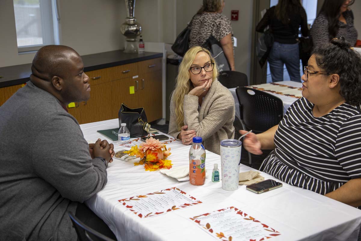 People enjoying the Counselor's Breakfast
