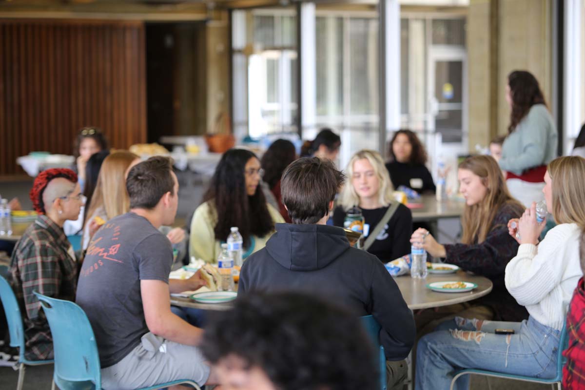 People enjoying the Honors Meet and Greet