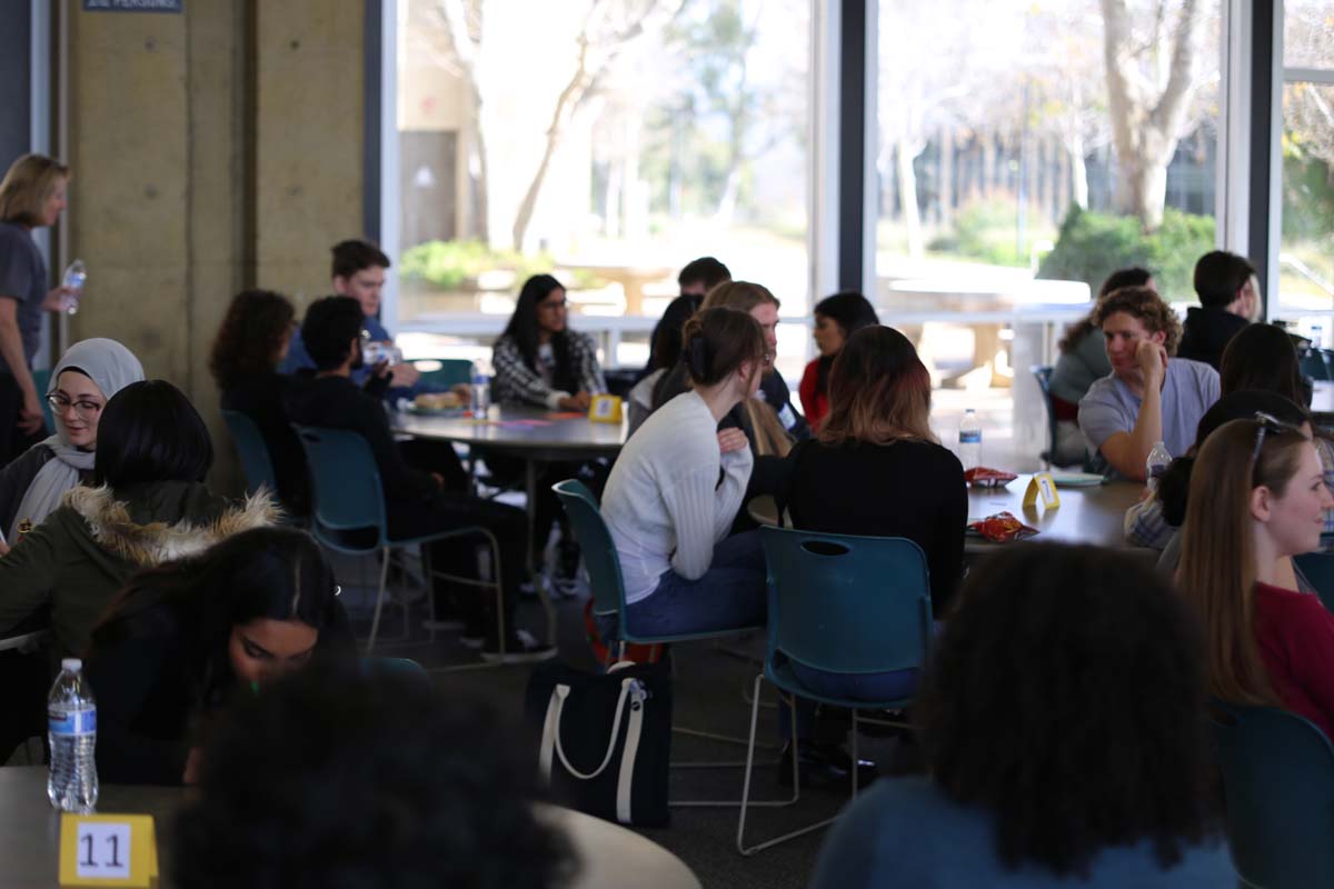 People enjoying the Honors Meet and Greet